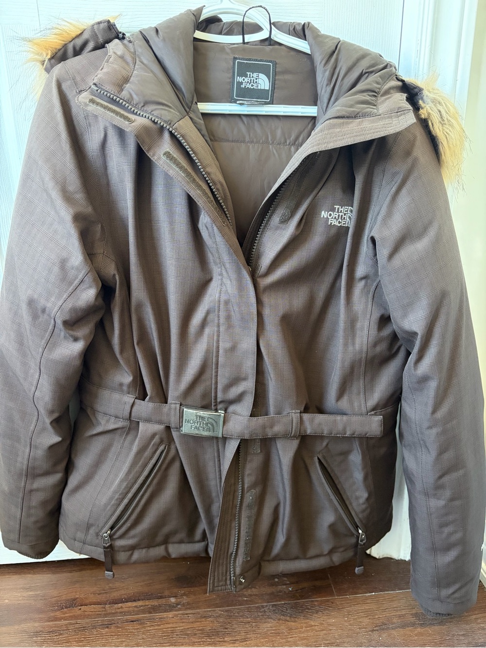 The North Face Women's Jacket in Dark Brown with Black Logo Patch